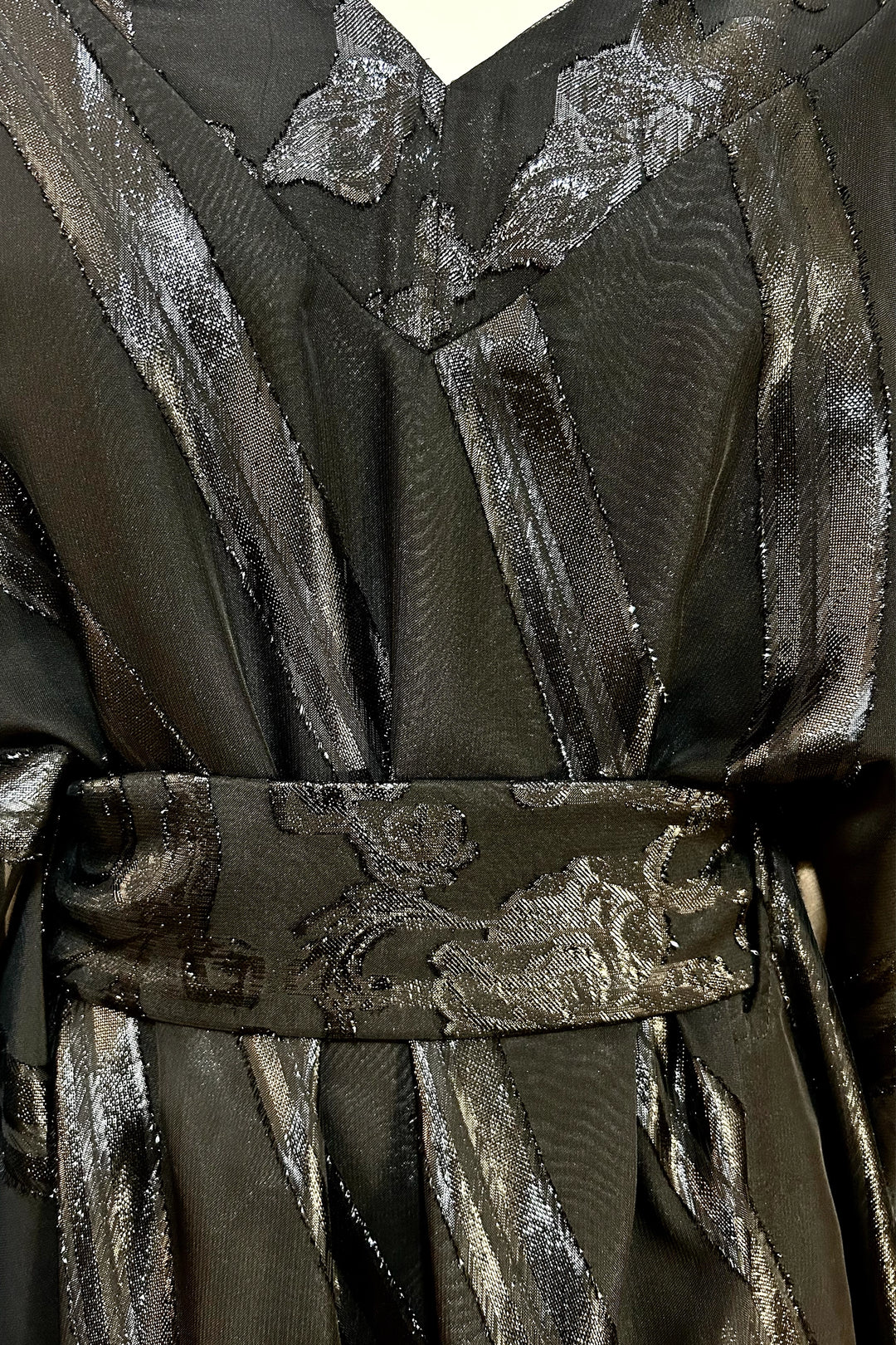 close up of obi Belt on Lucie black gloss stripe Kaftan 